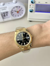 40 Onyx 10 Baguette Diamond Dial