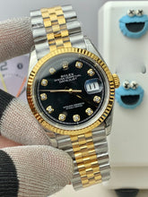 Onyx 10 Baguette Diamond Dial Day-Date Yellow Gold