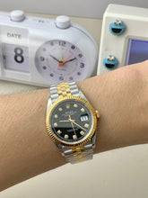 Onyx 10 Baguette Diamond Dial Day-Date Yellow Gold